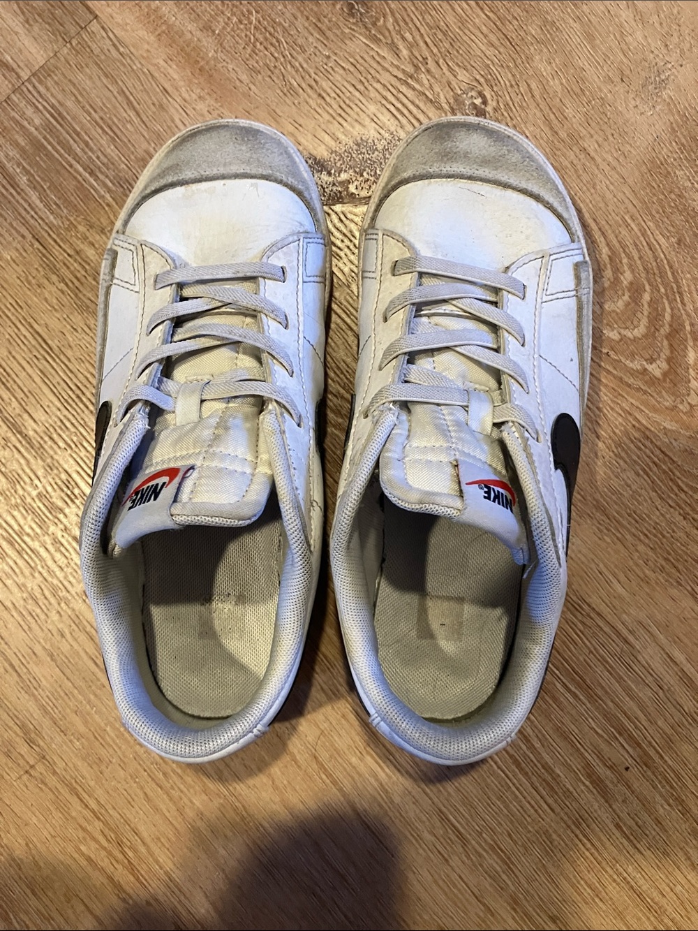 Nike Kids White Sneakers with Black Swoosh and Red Tongue Accent